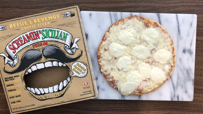 Screamin' Sicilian Bessie's Revenge pizza on a cutting board.