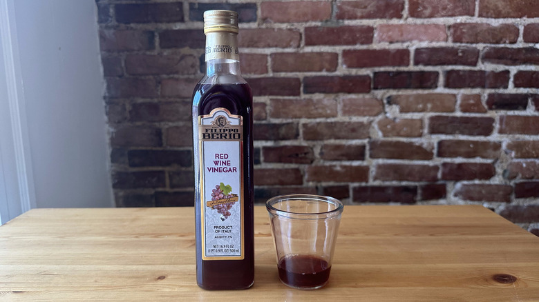 Filippo Berio Red Wine Vinegar on wooden table