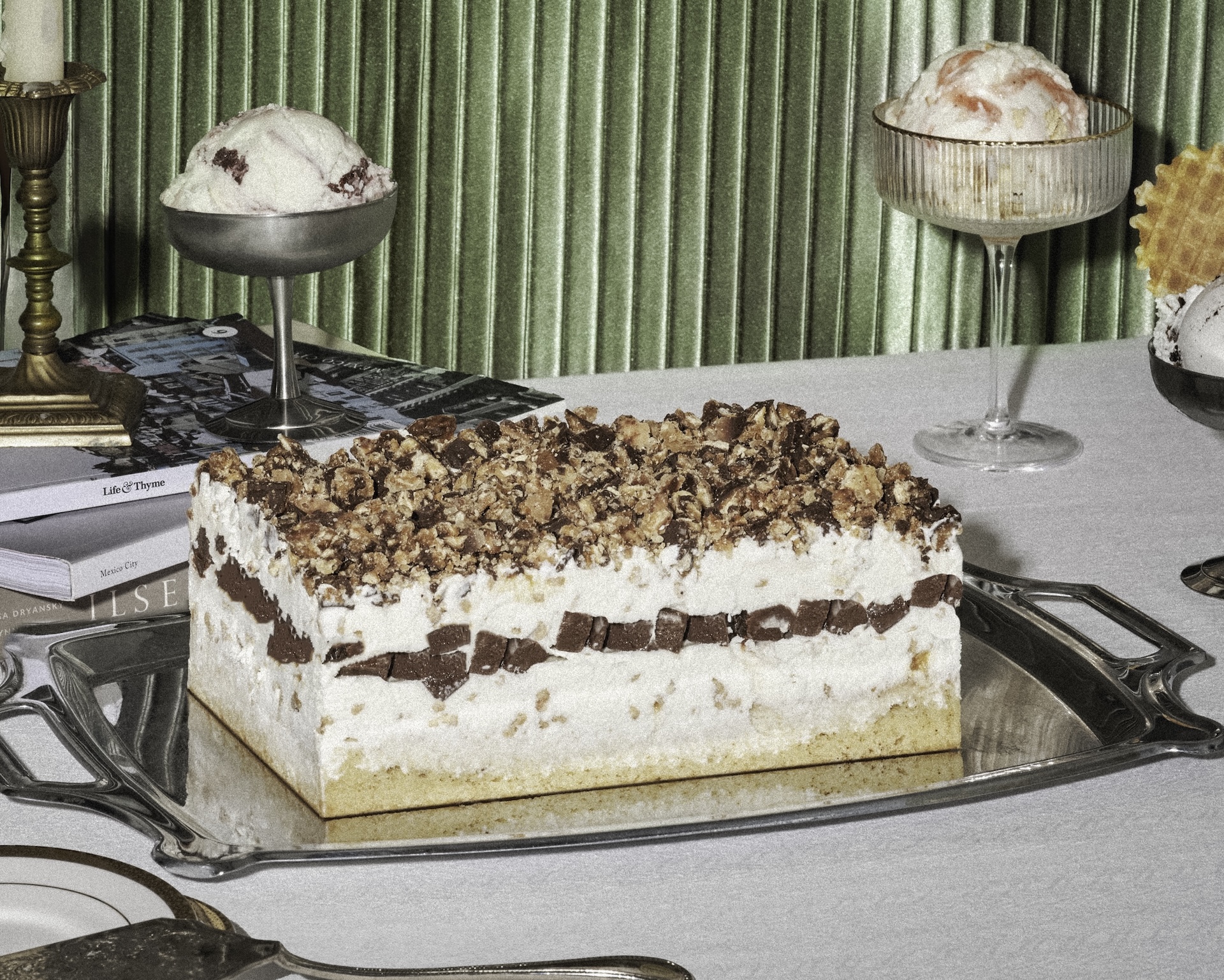 The Almond Brittle Cake: Double fold vanilla ice cream studded with Grandma Malek's almond brittle, house-made salted chocolate ganache, topped with sweet and salty clusters of saltine Florentine cookies, drizzled with chocolate (New) 