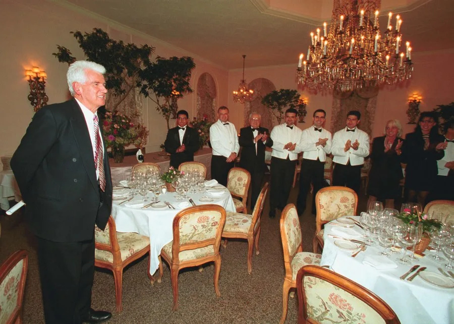 The waiters of the Barbetta restaurant congratula the their employer’s husband on winning the Nobel. (Photo by Rick Maiman/Sygma via Getty Images)