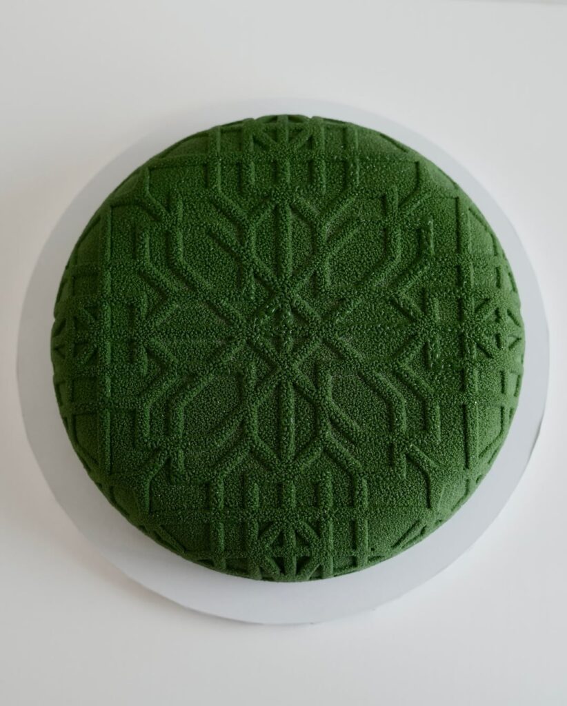 Pistachio, milk chocolate and raspberry entremet