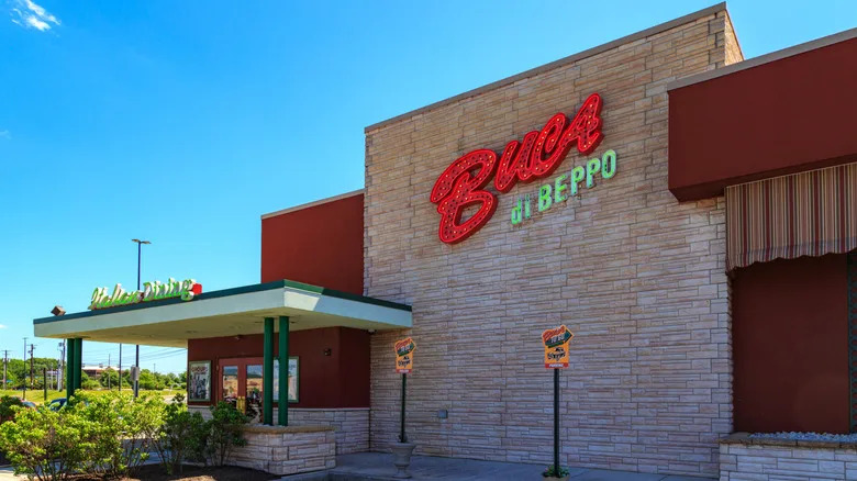 Exterior of a Buca di Beppo location seen against a blue sky