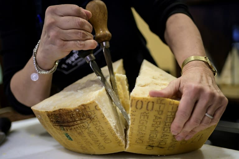 Ranked among the kings of Italian cheese, with its cows fed on hay and grass, Parmesan is facing slowing sales at home as the country's population declines (MARCO BERTORELLO)