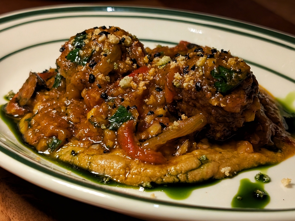 Lamb meatballs with smoked ricotta and hummus. — Picture by Ethan Lau Lamb meatballs with smoked ricotta and hummus. — Picture by Ethan Lau