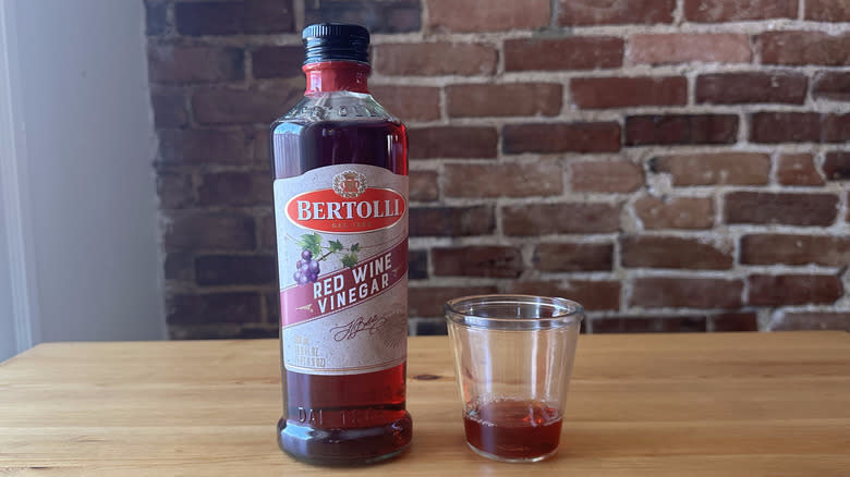 Bertolli Red Wine Vinegar on wooden table