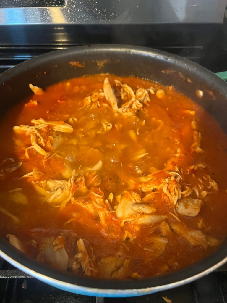 Chicken tinga and refried beans in making!