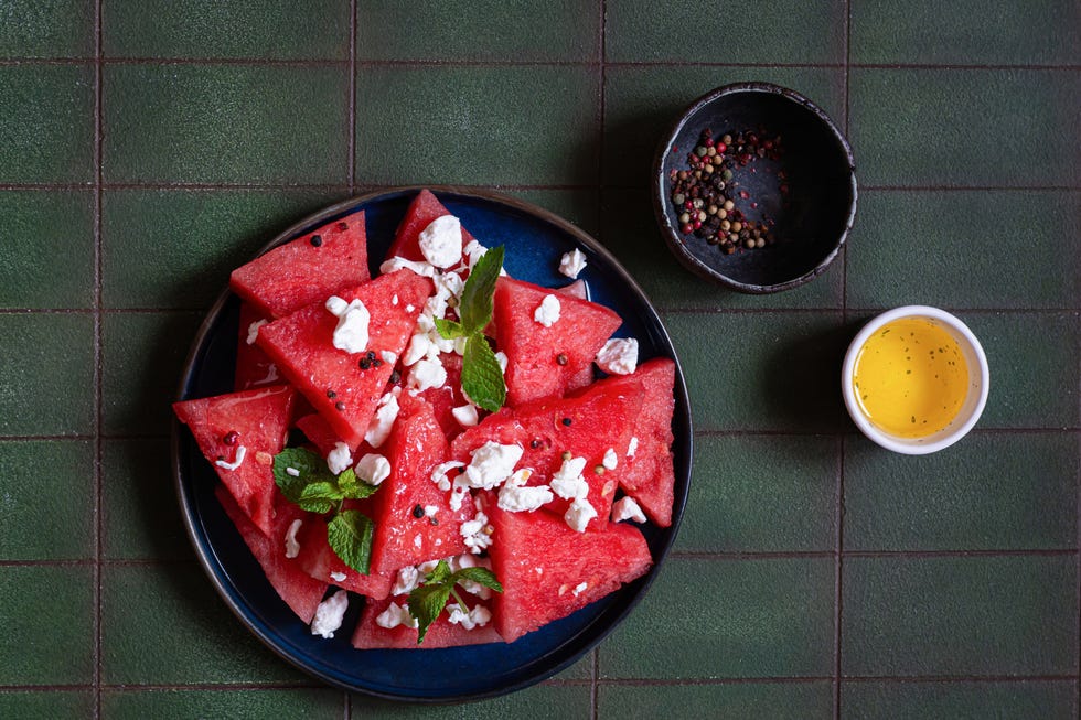 salad with watermelon pulp, feta, mint, and pepper. concept of healthy eating.