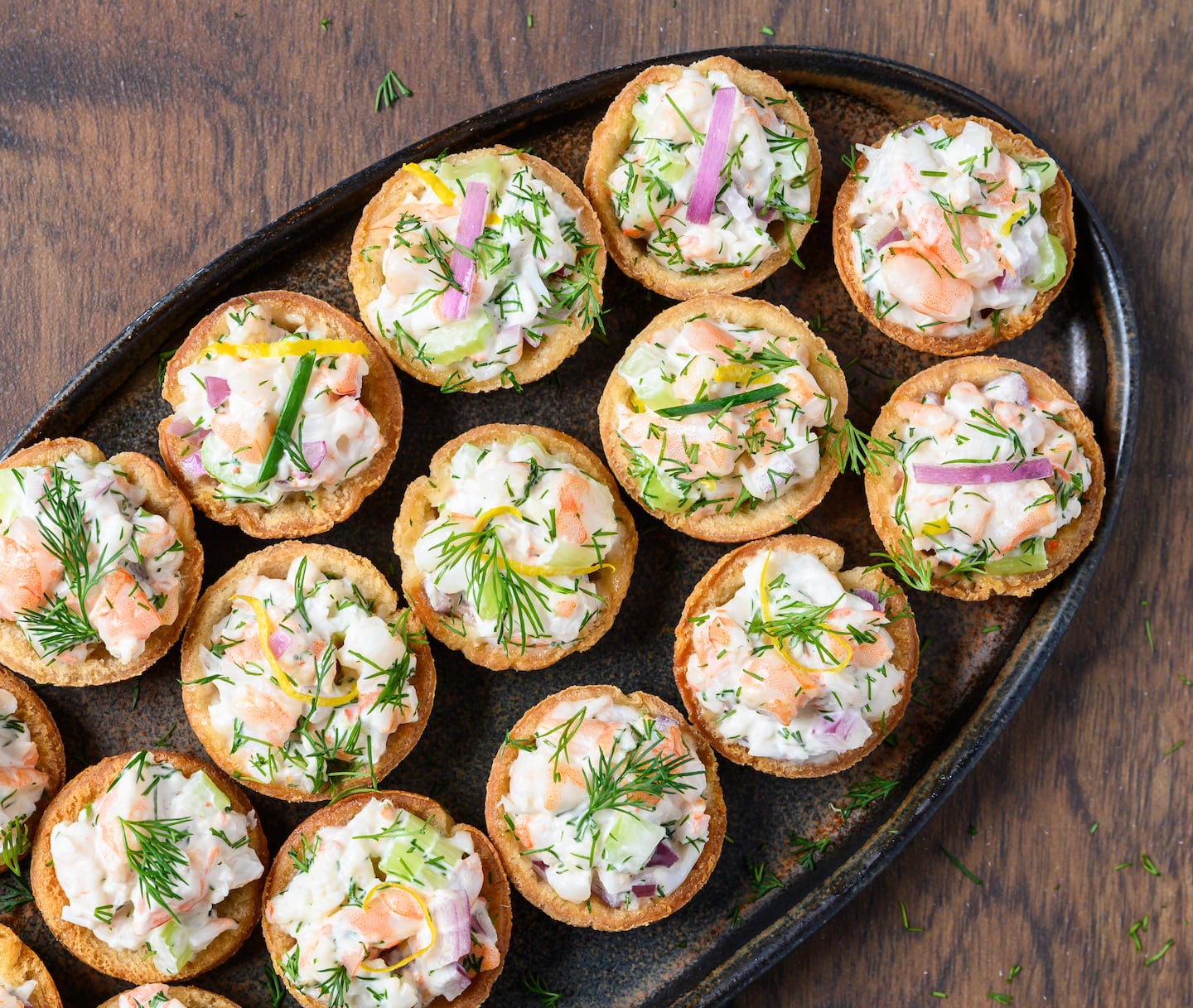 Shrimp salad in toast cups.