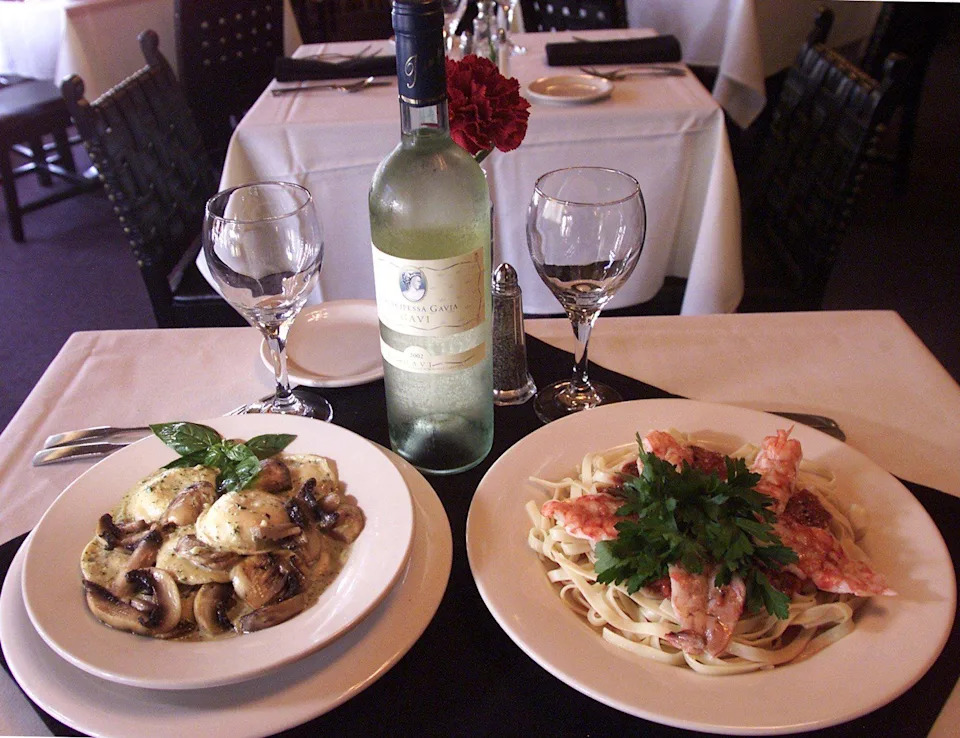 In this file photo from July 23, 2003, Aventino's Ristorante menu featured Ravioli Carciofi and Shrimp Diablo.