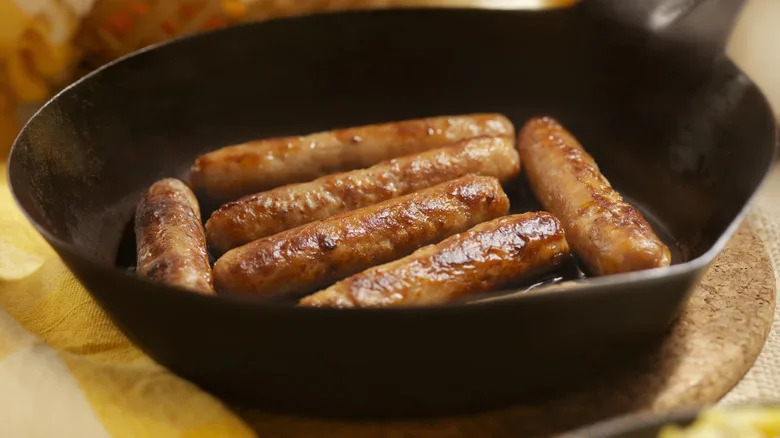 Breakfast sausages in a cast iron skillet