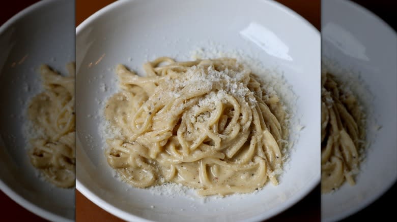 cacio e pepe pasta plated in a porcelain bowl at Vic's in New York City