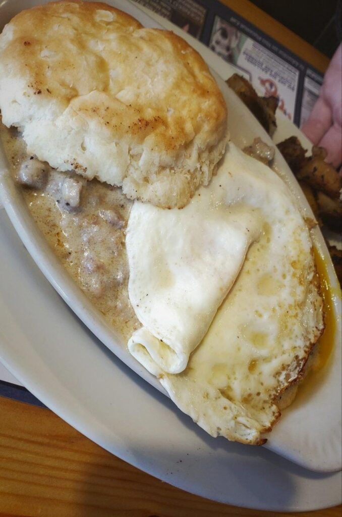 Fresh biscuit & gravy with overeasy egg