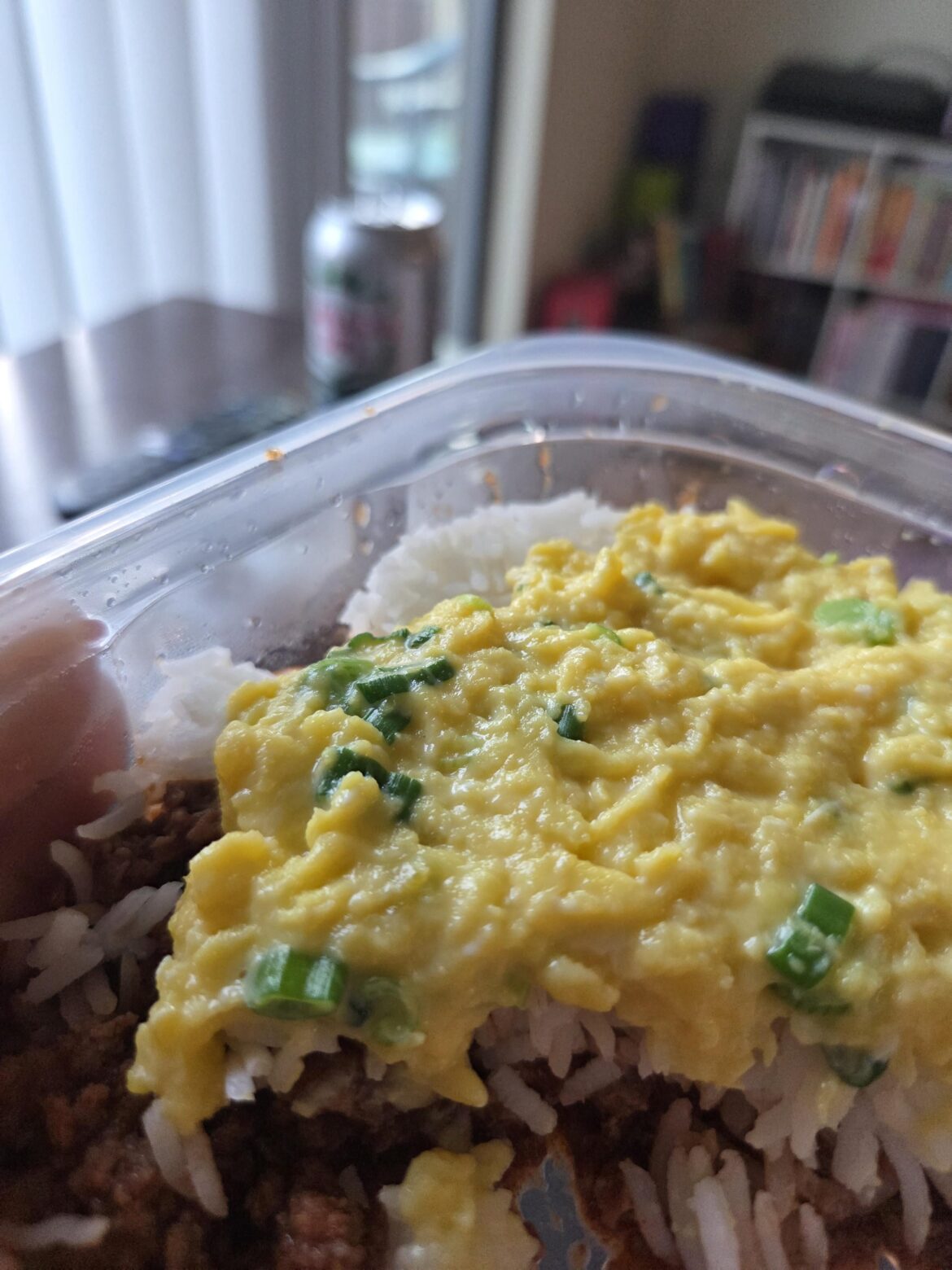 Soft scramble over leftover sloppy joe and rice