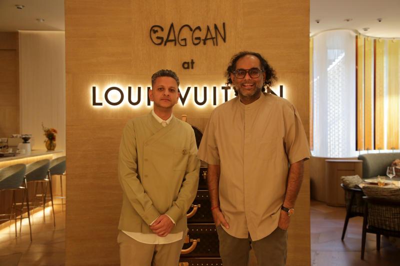 Chef Gaggan Anand, right, with chef Vix Rathour at Gaggan at Louis Vuitton. photo courtesy of Chanat Katanyu