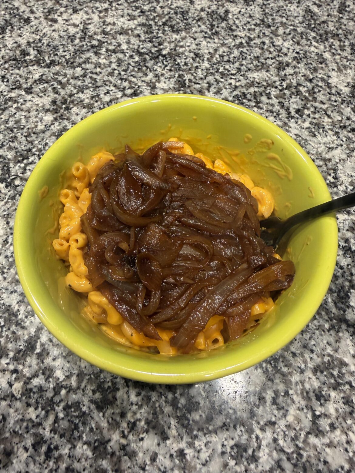Mac n cheese smothered in onions