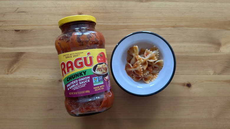 Chunky Sauteed Onion and Garlic Sauce with pasta in white bowl