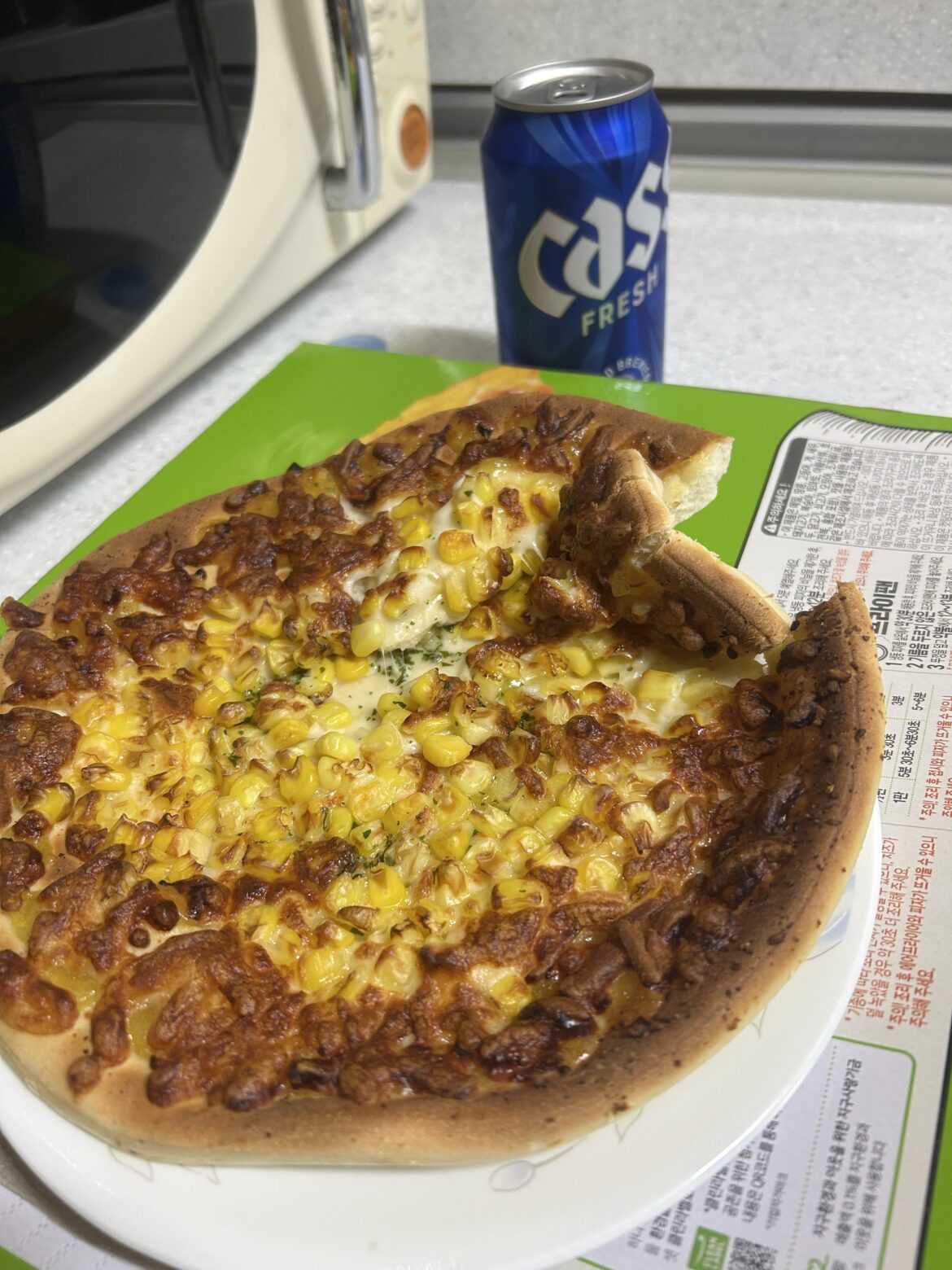 Corn pizza with beer