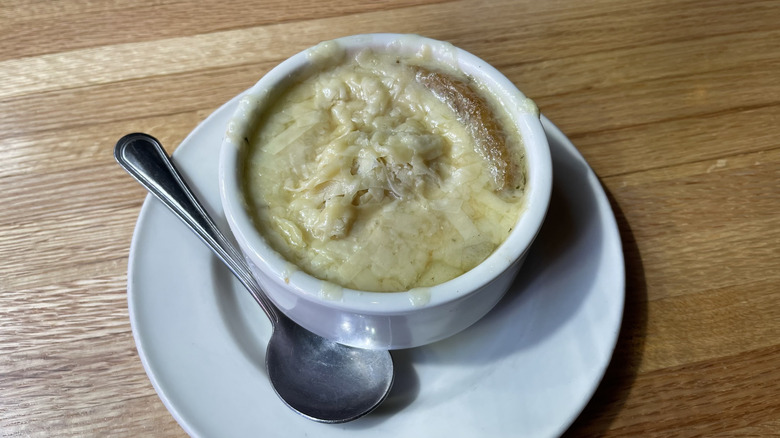 The French onion soup from Applebee's on a white plate