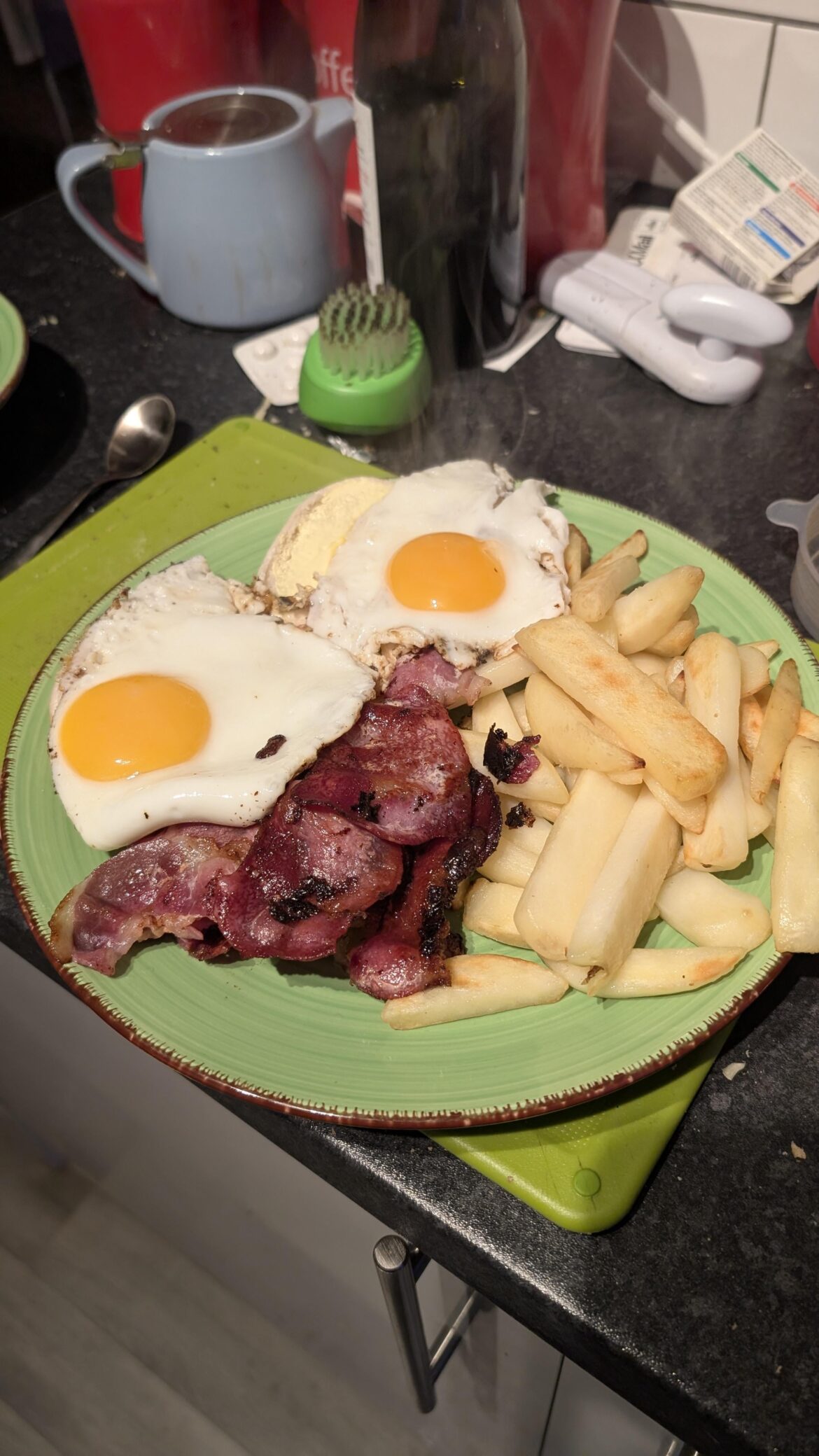 Quick Monday night scran- bacon, egg, chips, and a bread roll slathered in butter