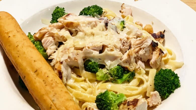 Applebee's Classic Broccoli Chicken Alfredo, served with a breadstick