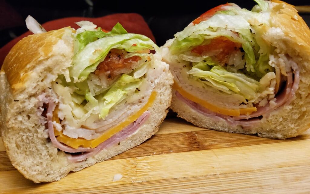 Just a late night snack. Ham and turkey hoagie with cheddar and shaved aged provolone.