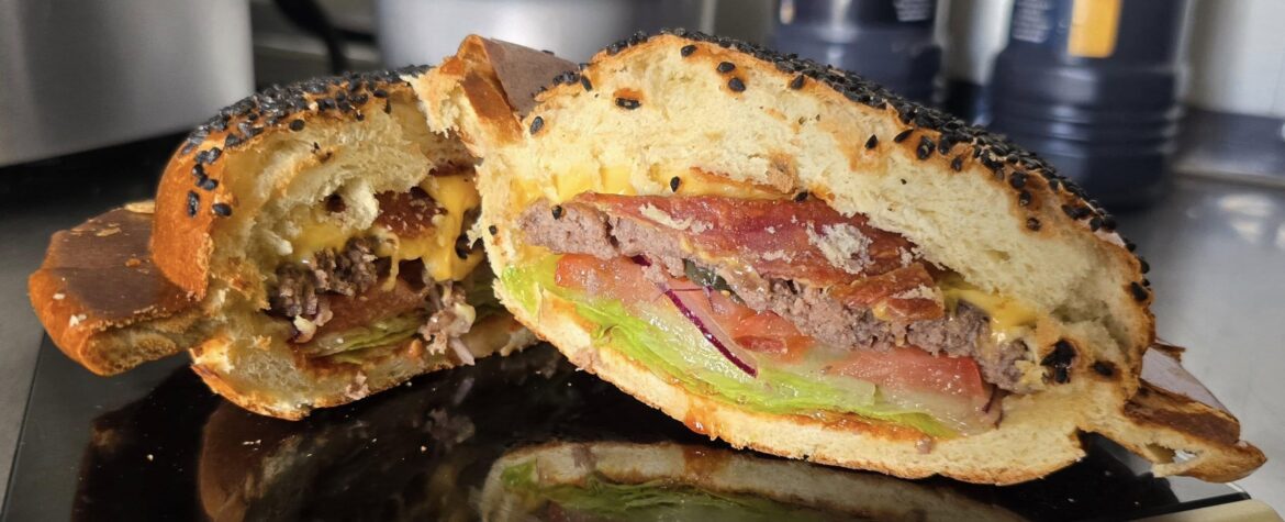 Homemade UFO burger with bacon and cheddar