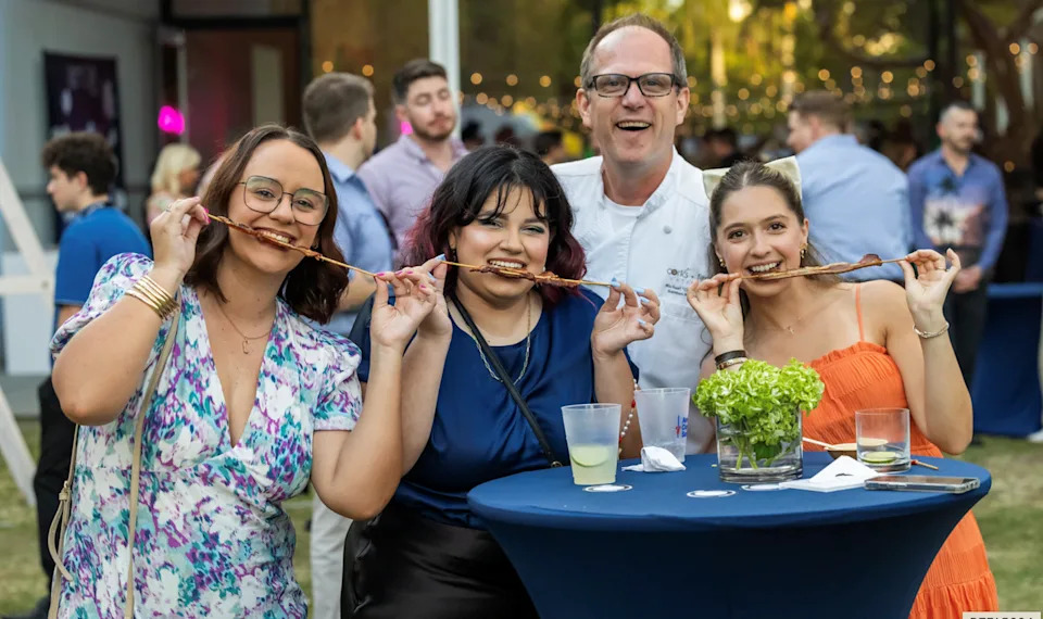 A fun moment from a past Fork Cancer evening at The Norton Museum.