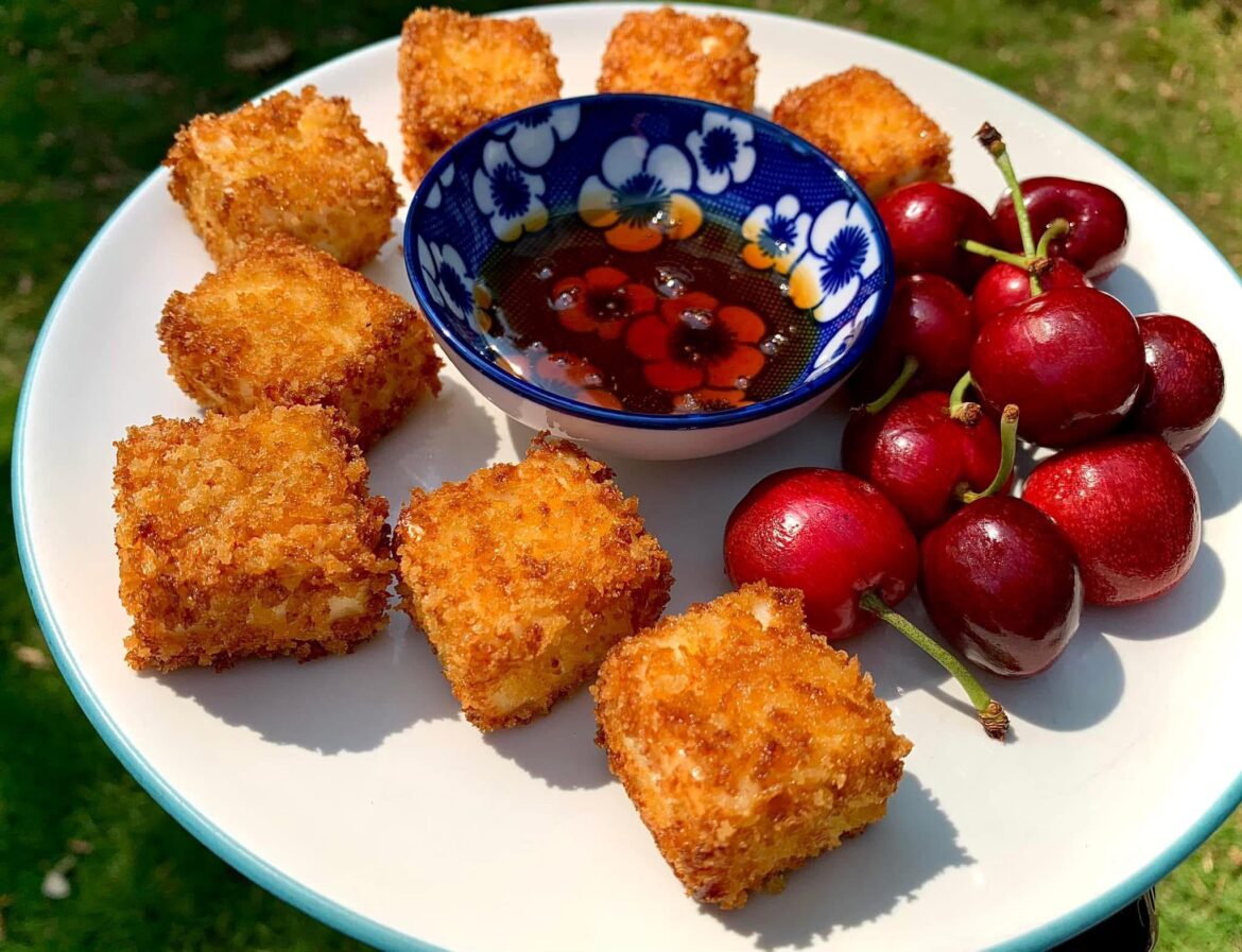 Spice rubbed, panko crusted fried Paneer cheese with hot honey and cherries.