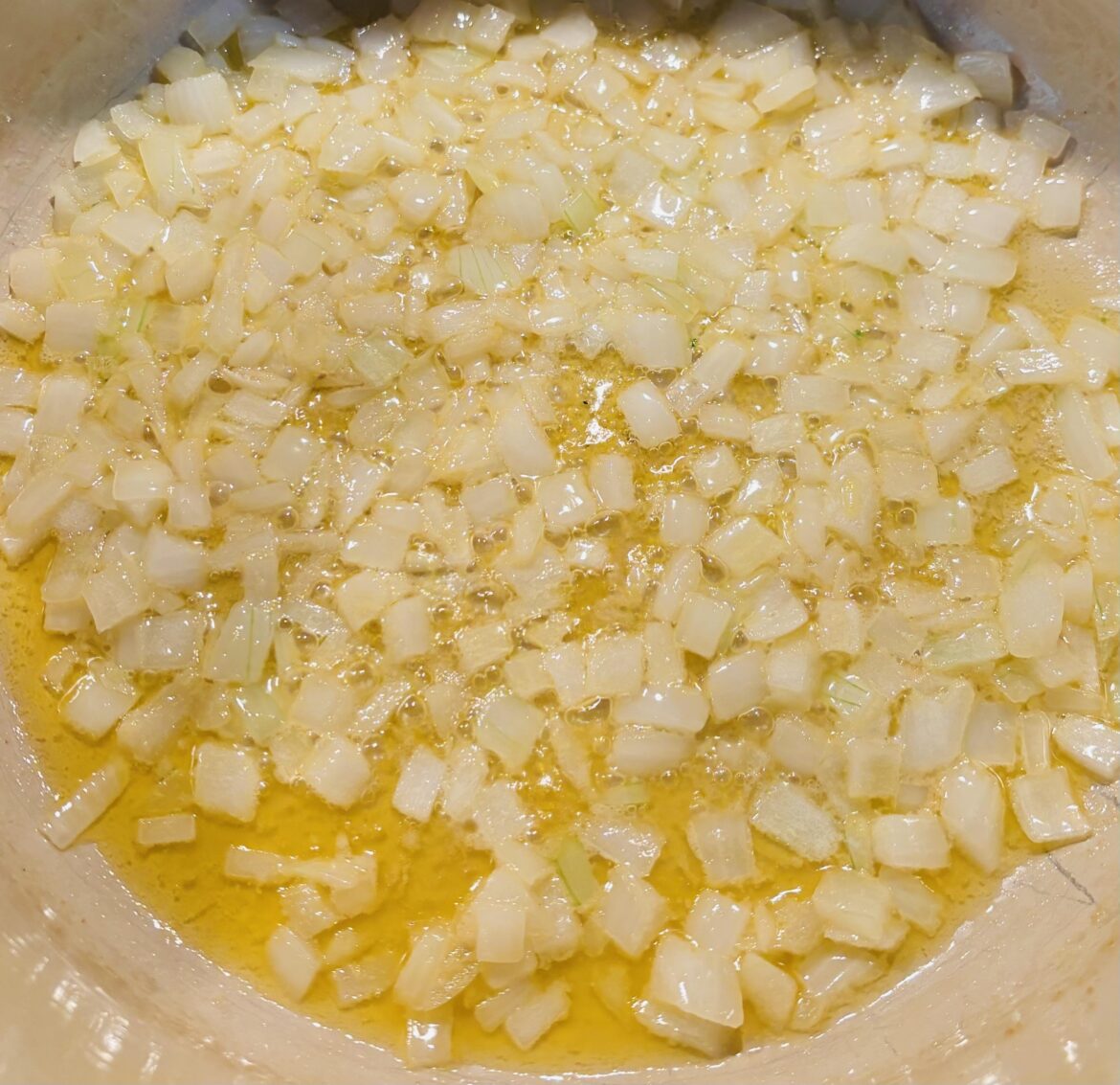 sautéing onions and garlic in butter