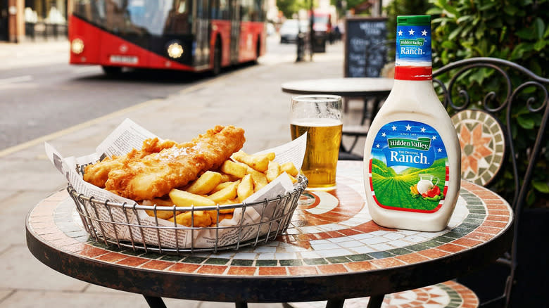 Hidden Valley Ranch dressing on a table in England beside a basket of fish and chips and a pint of beer