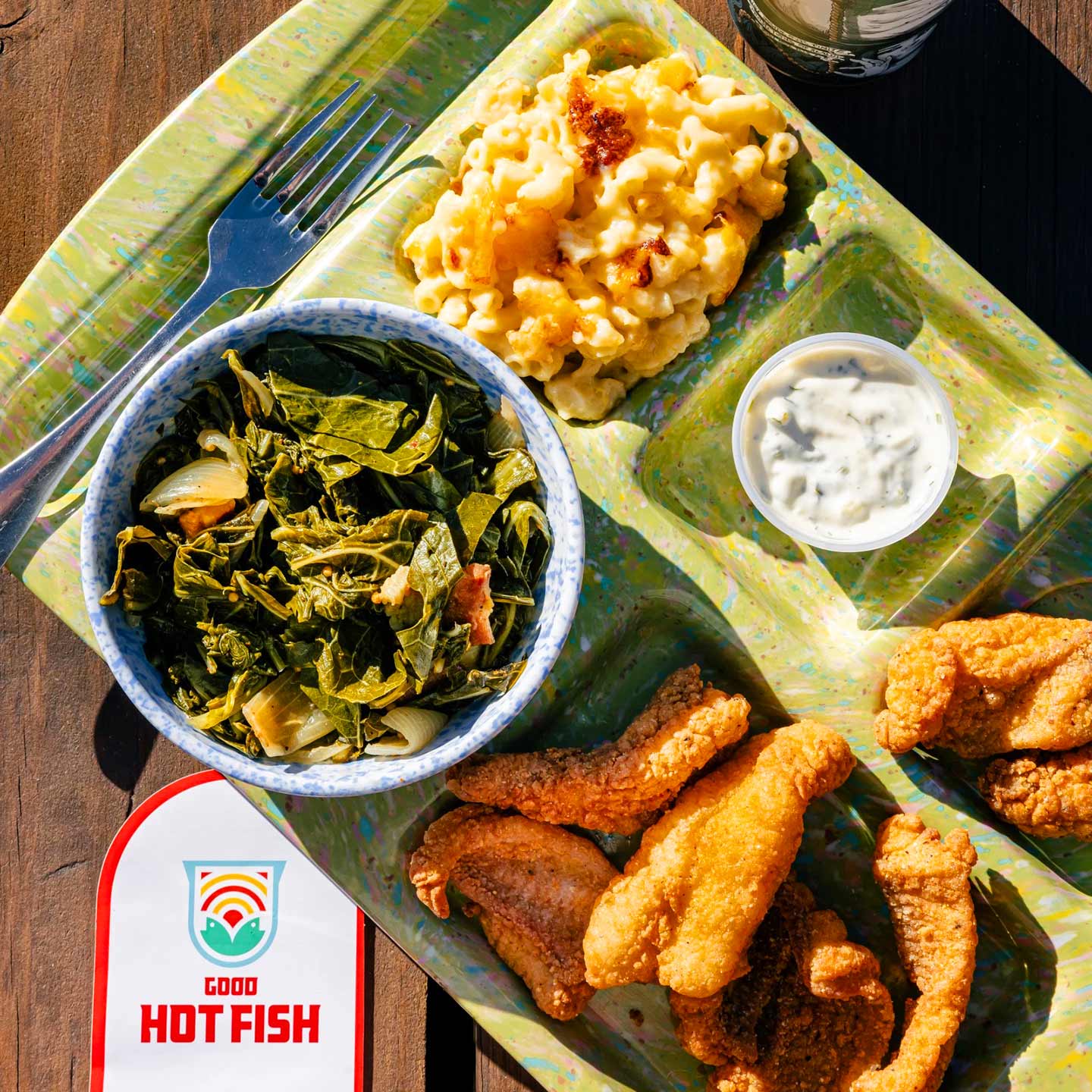 Collard greens are stewed low and slow with a little meat at Good Hot Fish. © Tim Robison/Good Hot Fish