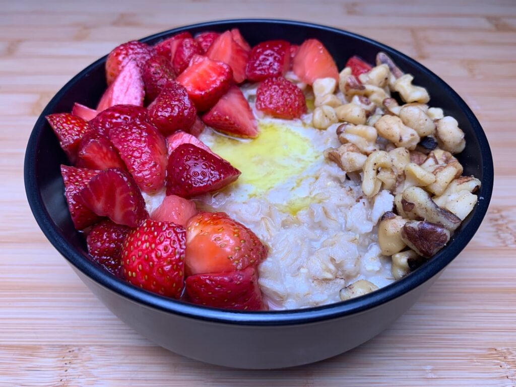 Macerated Strawberries, Walnuts, and Kerrygold on Old Fashion Oats
