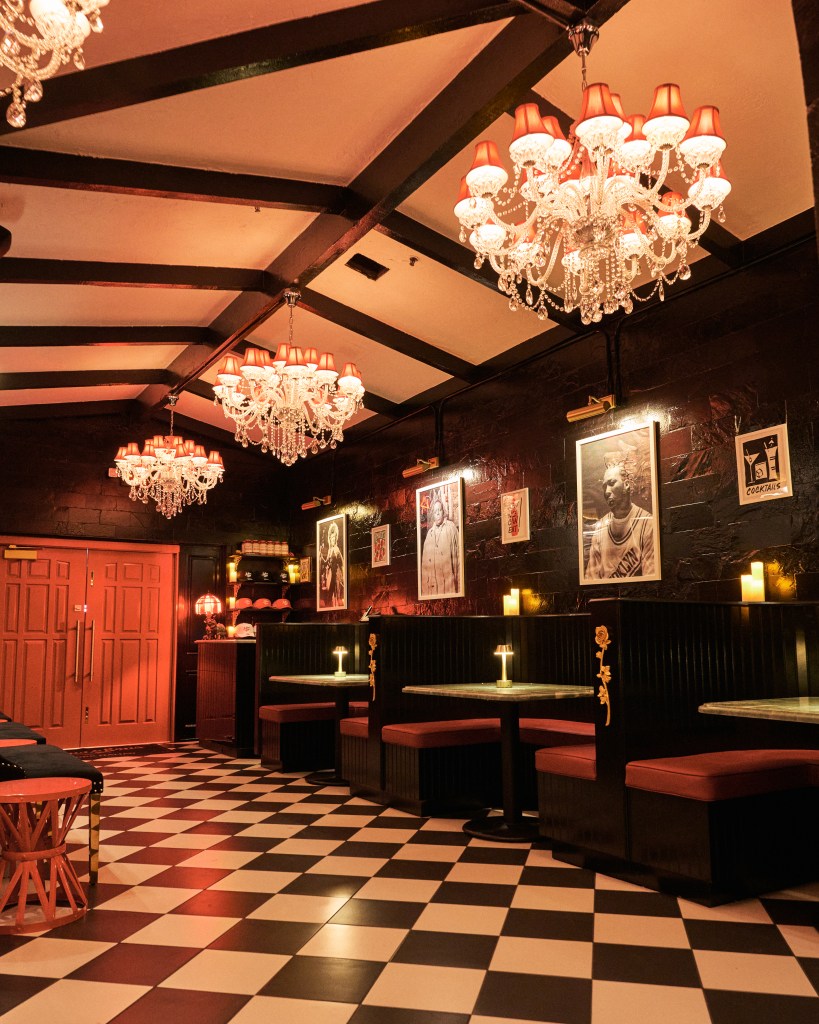 Black and red are the theme colors in the expansive dining room designed to have the atmosphere of a social club. (Photo: Courtesy of Arthur & Sons)