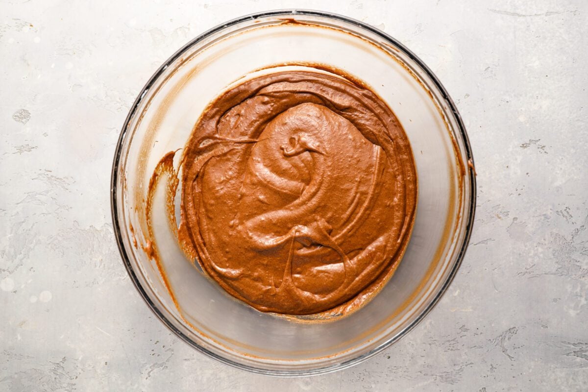 medium bowl with egg white/sugar mixture combined with melted chocolate