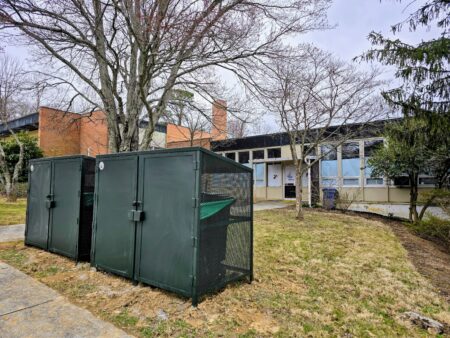 Four food scrap bins inside a wildlife proof Bearicade Bin at the North Asheville Community Center. 