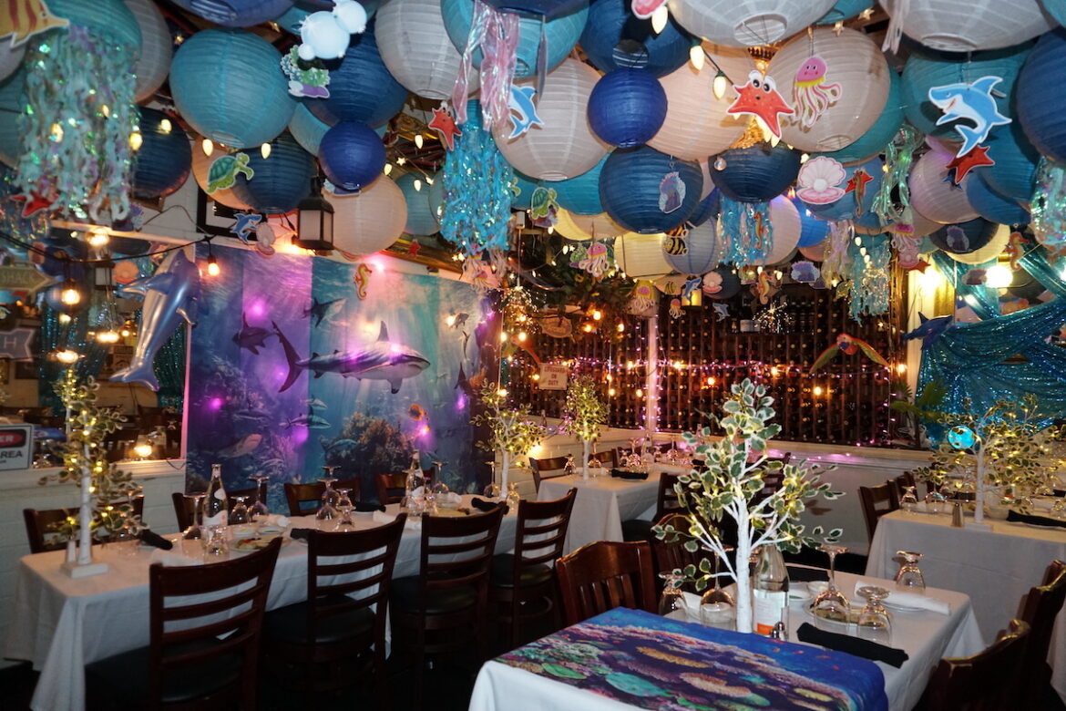 This Whimsical Italian Restaurant Is Transforming Into A Retro-Inspired ‘Under the Sea’ Escape — Dive Into A Summer Of Floating Jellyfish, Cheeky Sharks, & Seaside Nostalgia
