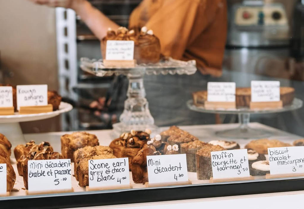 Image shows a row of pastries in a display counter at Cafe Feuillette. 