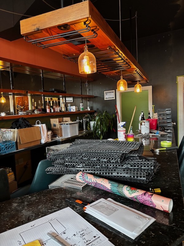 By the bar in Gumba's new space.