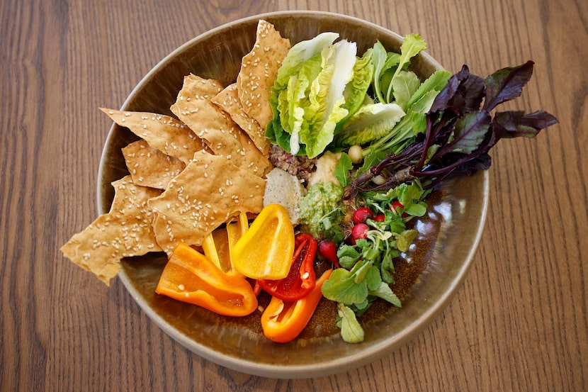 A plate of Carte di Musica e Crudite is a light, bright starter for the table at Caffe Lucca.