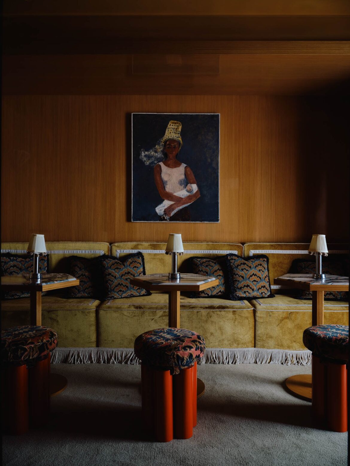 salon seating area with dark yellow chairs