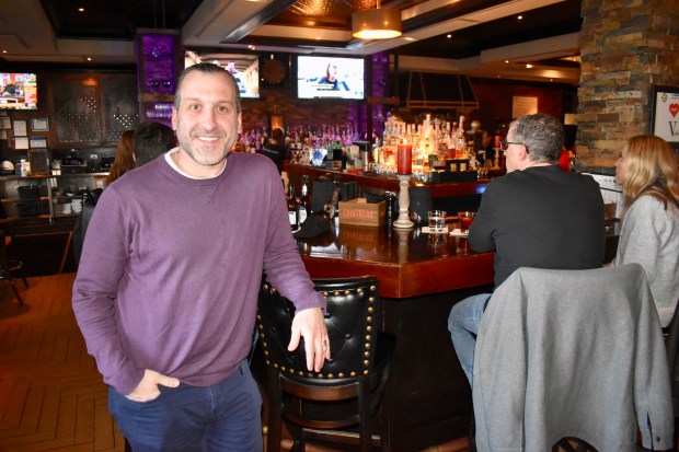 Some diners choose to eat at the well-stocked bar that's part of VAI's Italian Inspired Kitchen + Bar in Naperville, co-owner Anthony Vai says. (Steve Metsch/Naperville Sun)