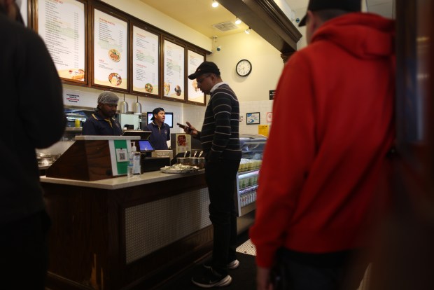 Customers order at the counter of Mylapore restaurant in San Jose on Monday, Feb. 23 2026. (Aric Crabb/Bay Area News Group)