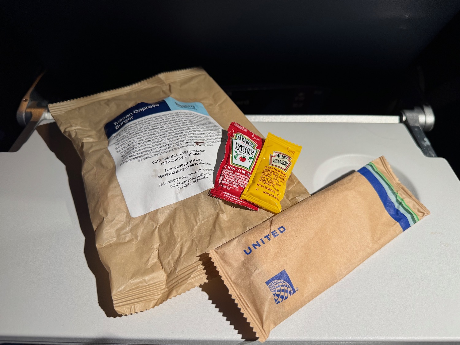 a brown bag with small packets on it