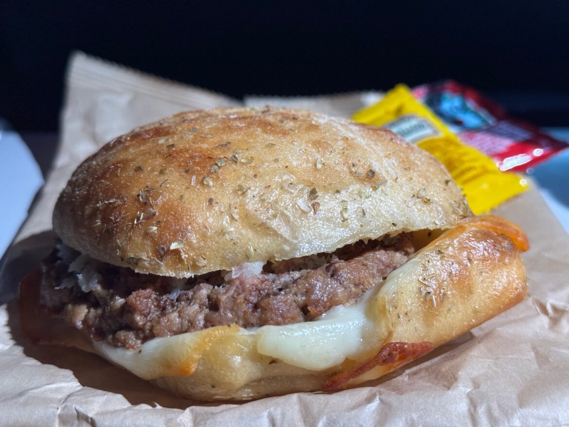 a burger on a paper wrapper
