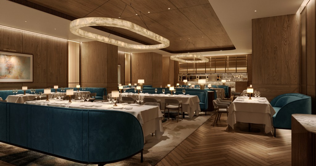 Upscale restaurant interior with wood-paneled walls, teal booth seating, white tablecloth tables, pendant lights, and warm lighting for a cozy dining atmosphere.