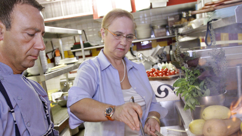 Lidia Bastianich cooking in restaurant