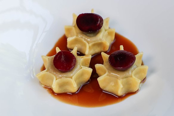 Pasta, such as sun-shaped duck ravioli, each topped with a pickled cherry, remains a strong suit.