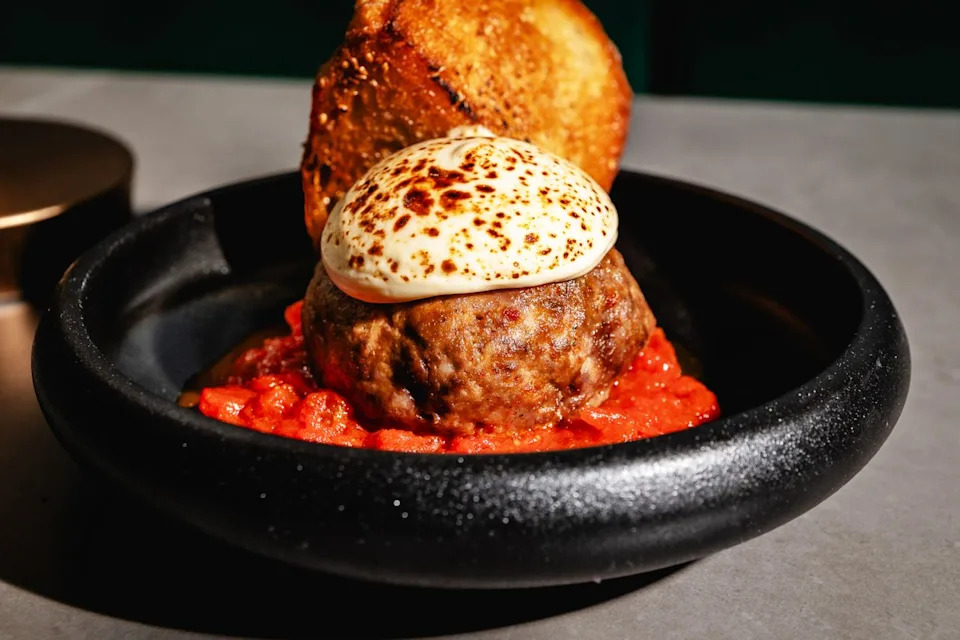 The popular caramelized meatball at OISE in Fort Myers, Florida.Credit: Photo By German Garcia / Bradley Kilgore
