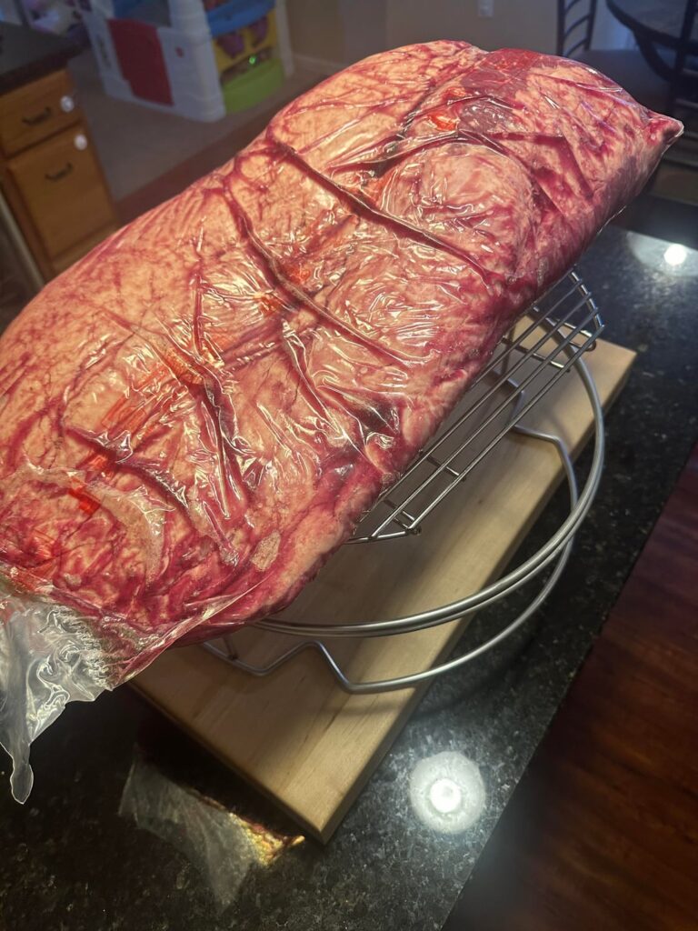 Meat too large for large egg. Which end to cut off?