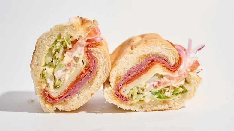 Subway's spicy Italian sandwich has been sliced in half to reveal its ingredients
